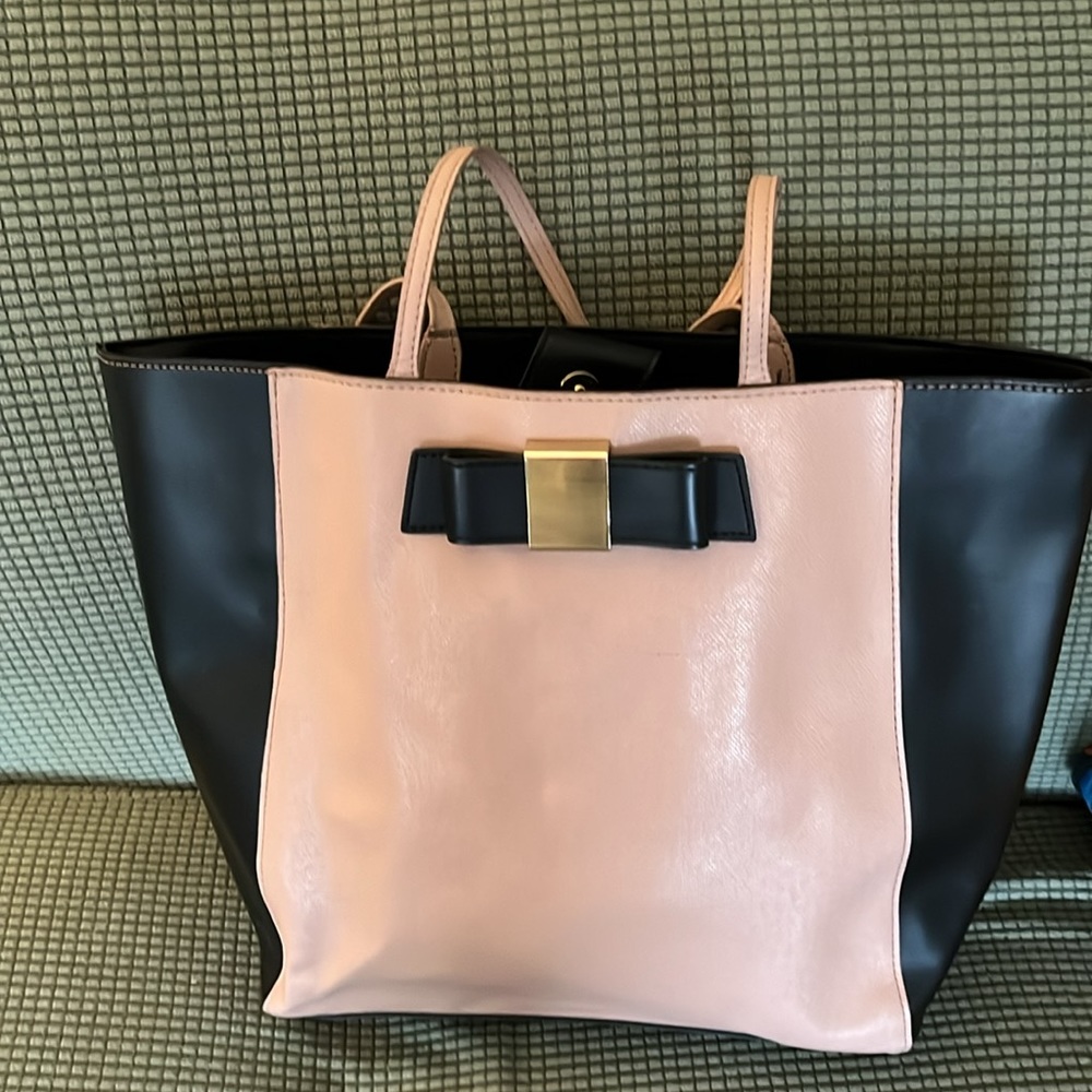 Ivanka Trump Pink and Black Pocketbook, gold interior.